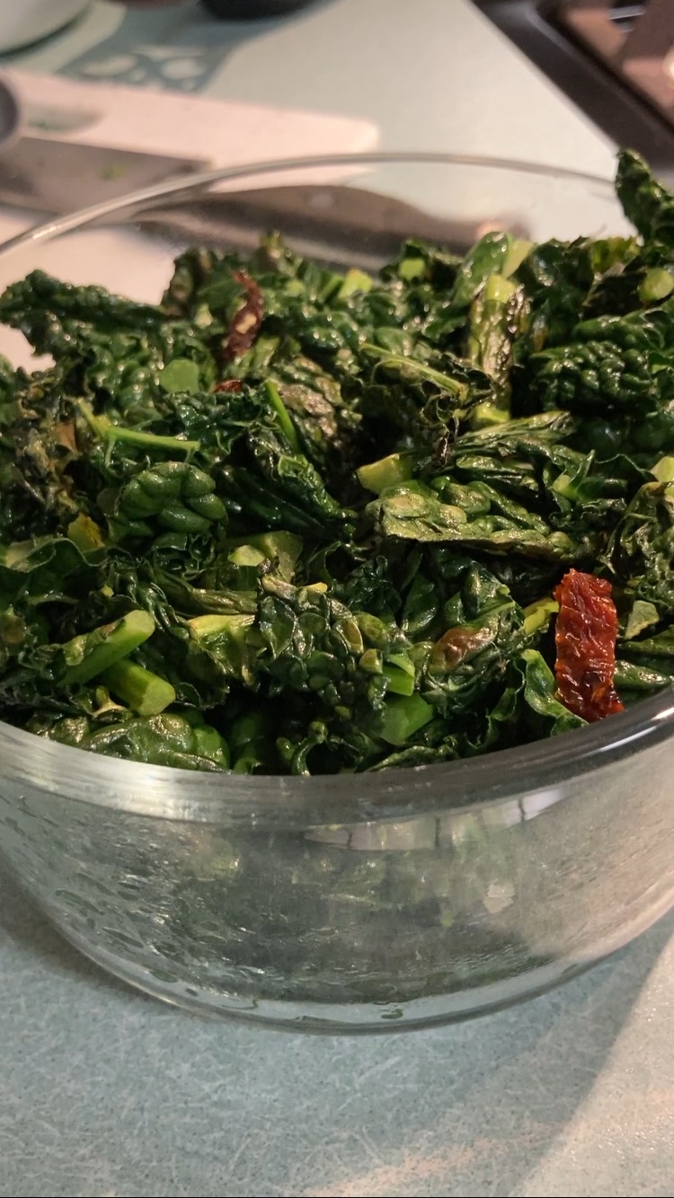 Kale and sundried tomatoes in bowl